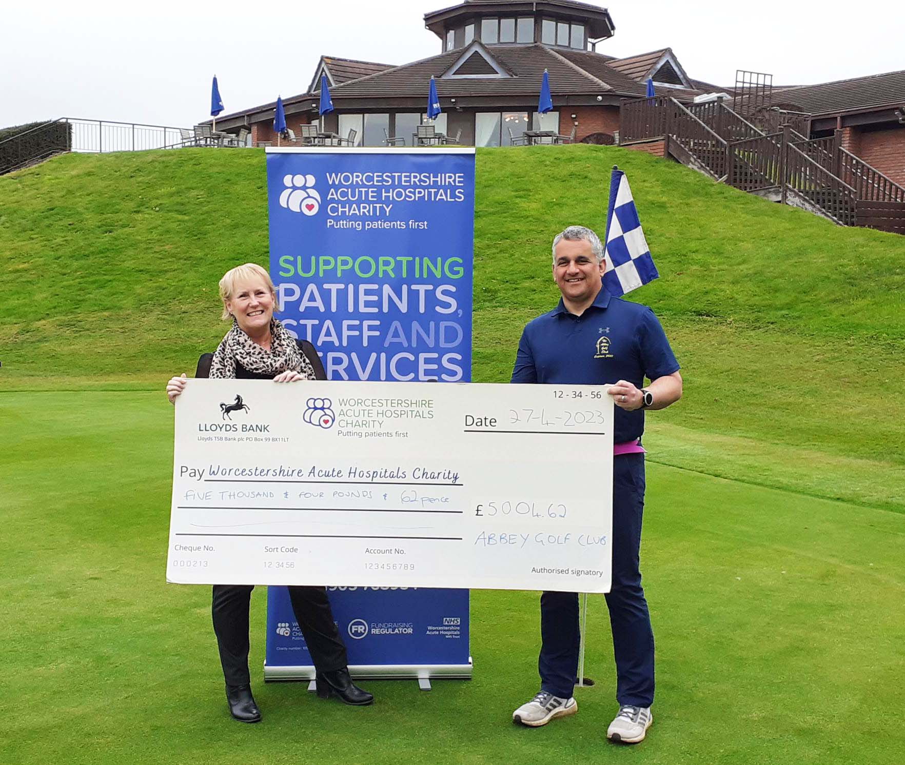 Abs Rohomon and Nicky Langford cheque presentation