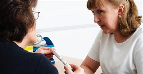 doctor talking to patient