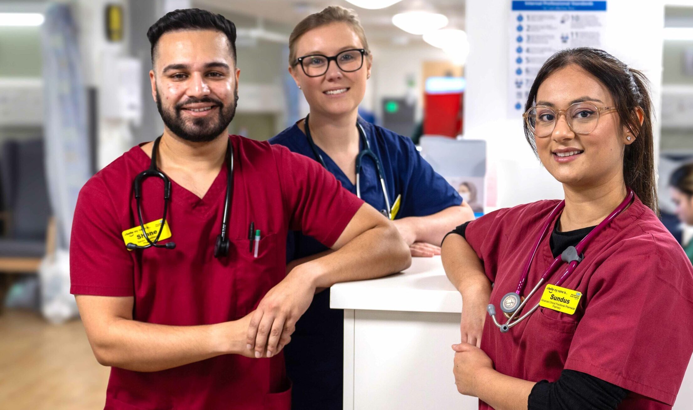 Pharmacy team on ward smiling at camera