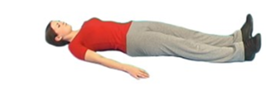 Person lay flat on ground with legs straight clenching buttocks
