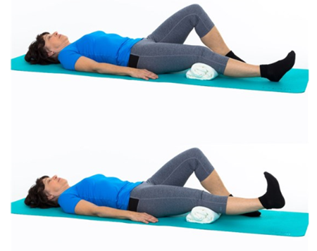 Person laying with both legs flat on the ground and a rolled up towel under knees then with one knee lifted and foot flat on ground while other leg is off ground, straight with foot flexing up and down