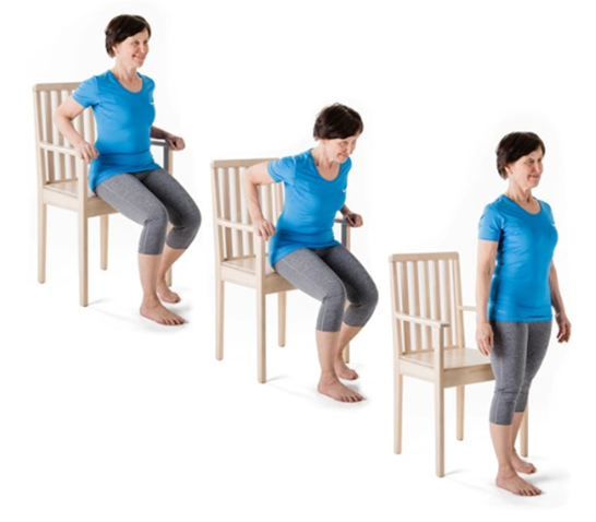 Person standing with one leg out in front using chair arms to push themselves up