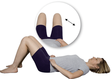 Person lay on back with head supported by a pillow. One knee is bent and is being dropped to side. Arrow indicates movement