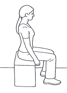 Person sat on chair tall and upright. Person slumps lower back and returns to tall and upright.