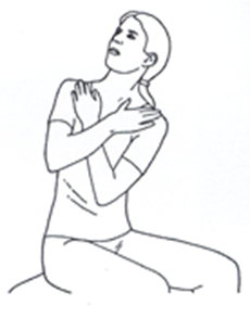 Person sat tall with arms crossed across body turning from waist to look up to one side