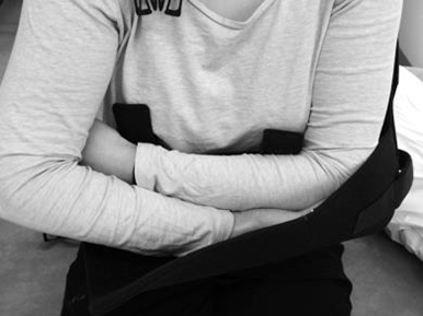 Image of sling having injured arm placed into it
