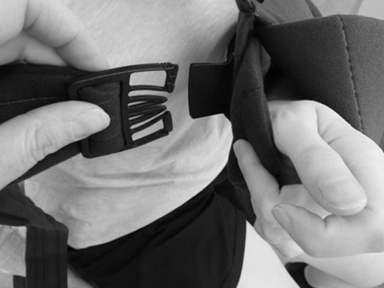 Image of body strap being clipped