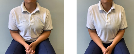 Image of person sat upright shrugging shoulders to ears and back down 