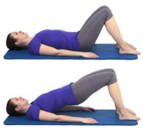 Person laying on a mat on the floor feet flat near bottom, knees bent  arms straight and flat on floor. 
Person then raises hips to ceiling keeping feet and back flat 