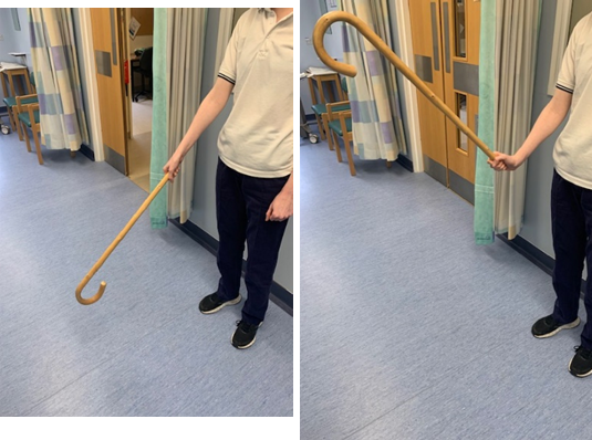 Images show an individual holding the bottom end of a walking stick so it is upright, then pointing the other end down and up. 
