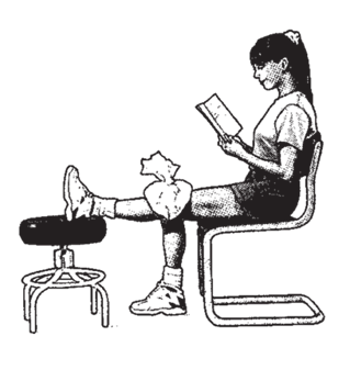 A girl sitting down with one leg on a stool and an ice pack on her knee.