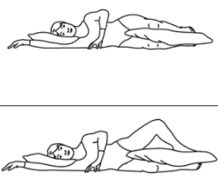 Person lay on mat on floor on their side. Head supported with lower arm a pillow between slightly bent knees.  Operated leg is shown rotated toward the ceiling. 