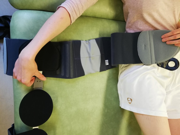 Person on bed brace open alongside them