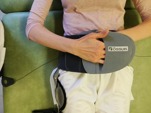 Brace fastened to front of body