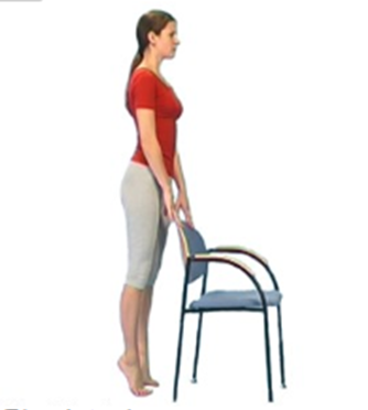 Person holding chair back standing on tip toes