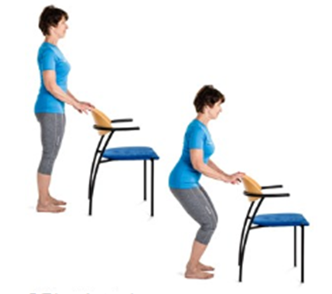 Person holding back of chair squatting