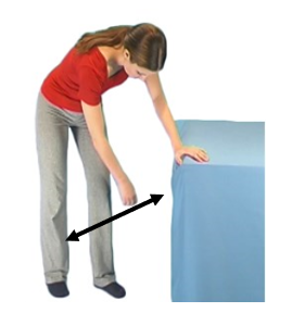 Image of person leaning on surface letting other arm swing like a pendulum side to side