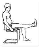 Person sat on chair straightening leg to front with toes pointing to ceiling