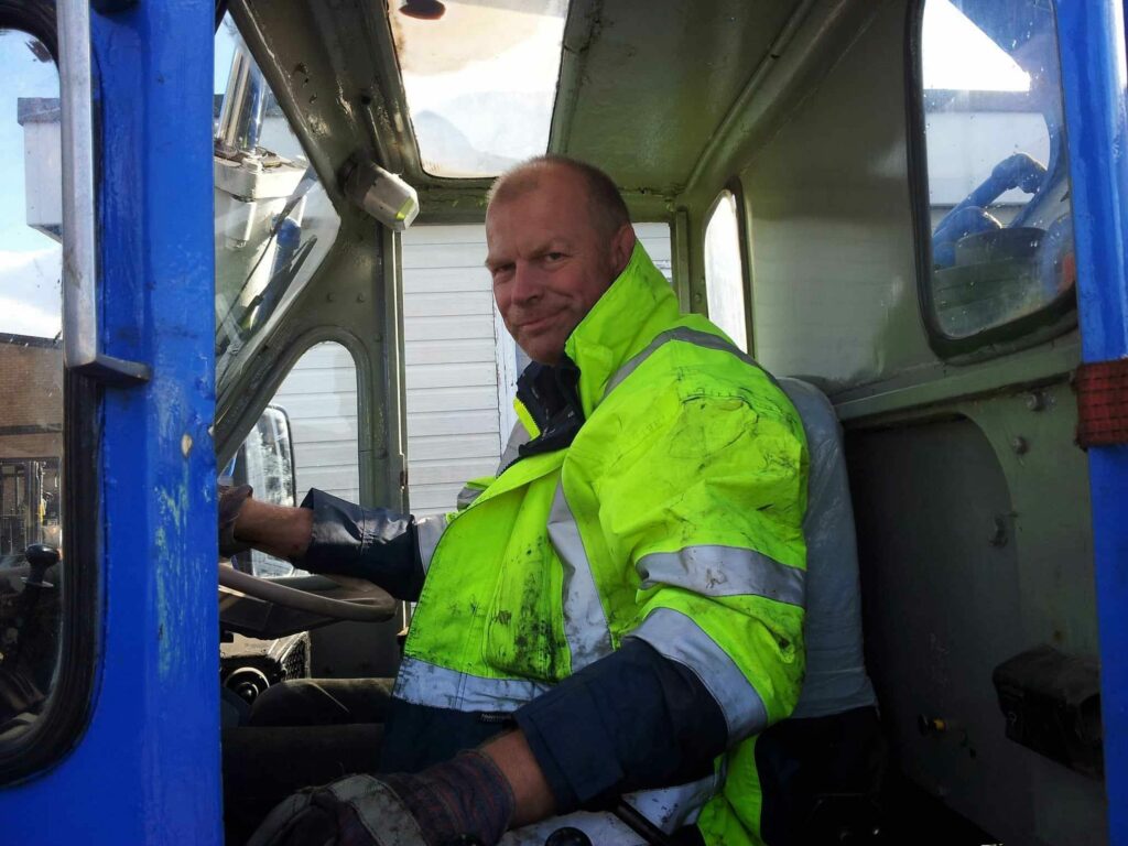 Sean sat in his cab working as a lorry driver whilst undergoing his treatment for PNH.