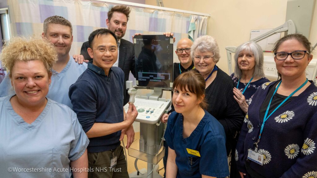 The donated ultrasound scanner surrounded by staff from the Urology Intervention Centre at the Alexandra Hospital and members of the League of Friends.