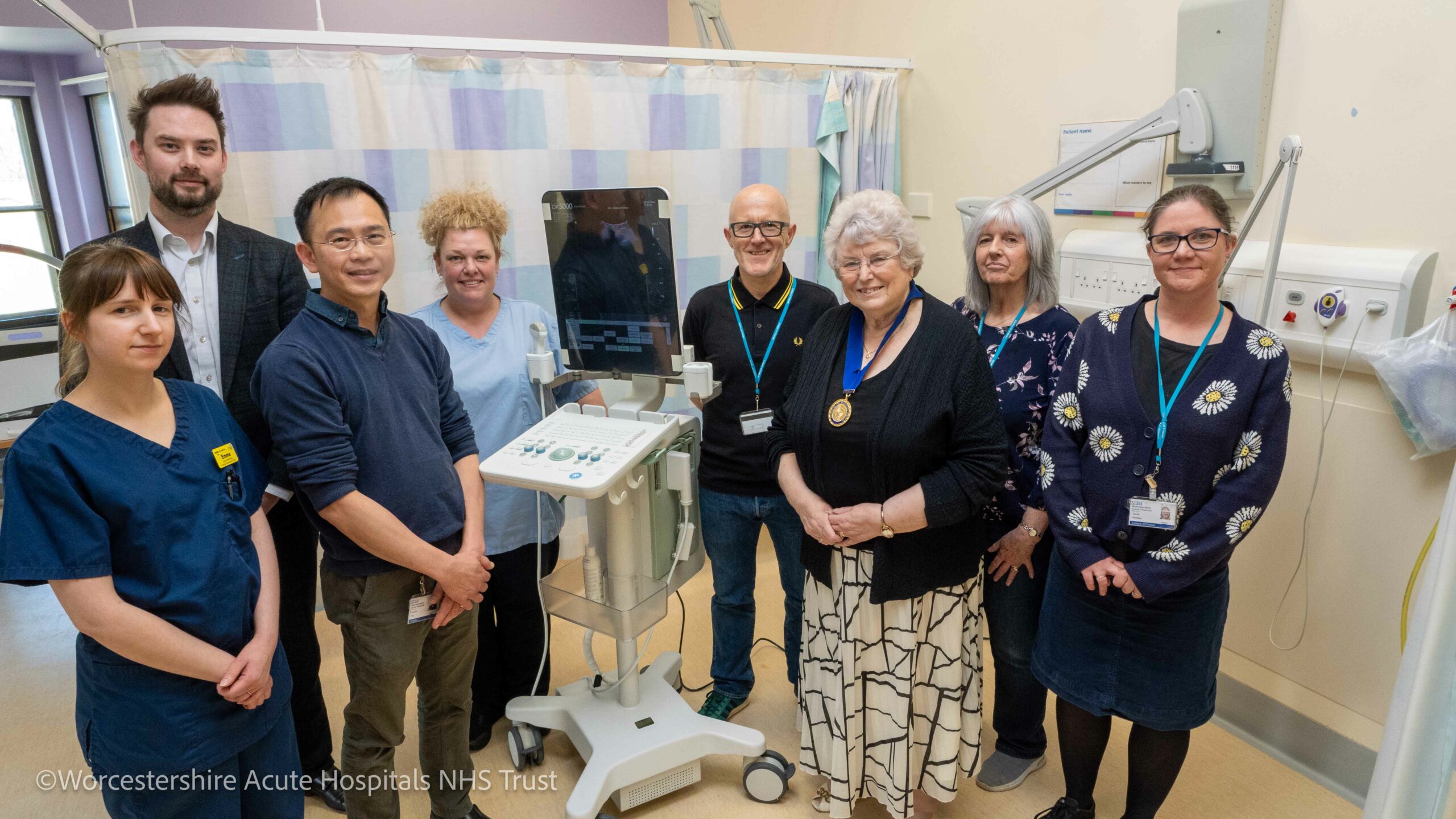 The donated ultrasound scanner surrounded by staff from the Urology Intervention Centre at the Alexandra Hospital and members of the League of Friends.