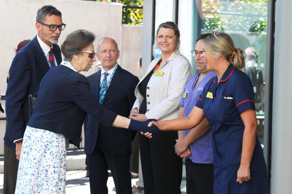 HRH The Princess Royal is welcomed by (left to right) Russell Hardy, Chair, Glen Burley, Chief Executive Officer and the Emergency Department senior leadership team from Worcestershire Acute Hospitals NHS Trust.