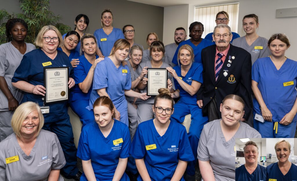 The Kidderminster Hospital Endoscopy team with holding their British Citizen Award certificates, stood with Fred Holland.