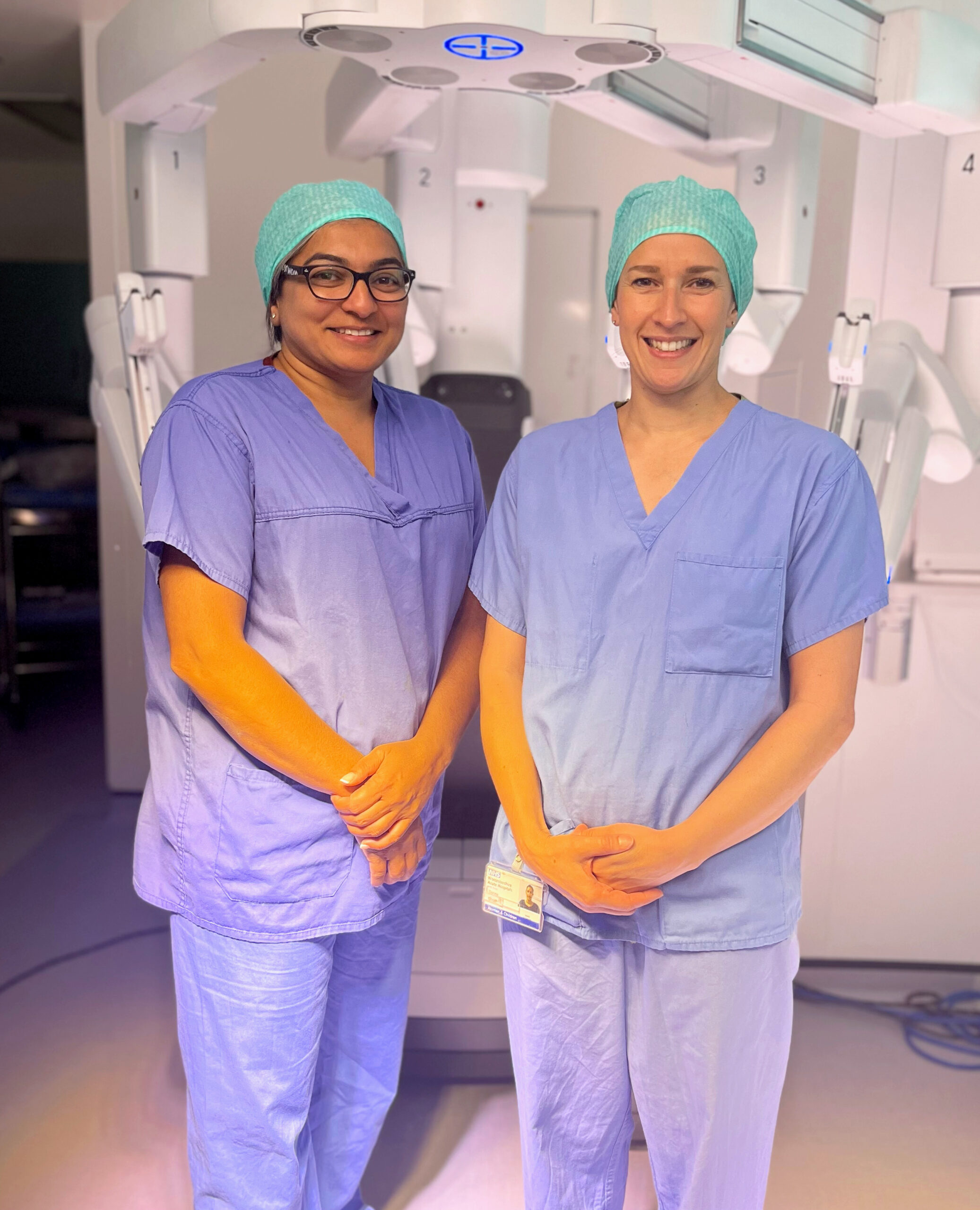 Miss Rina Panchal (left) and Miss Donna Ghosh (right) pictured in the robotic surgery theatre at the Alexandra Hospital, Redditch.