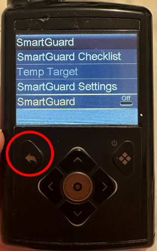 Photo of the Medtonic 780G screen, red circle shows arrow on the device on left hand side