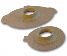 An image of two laryngectomy baseplates.