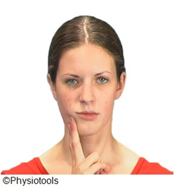 An image of an individual shown from the front their lower jaw is being moved to the side using their fingers