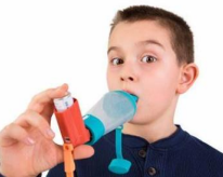 Photo of a child using an inhaler