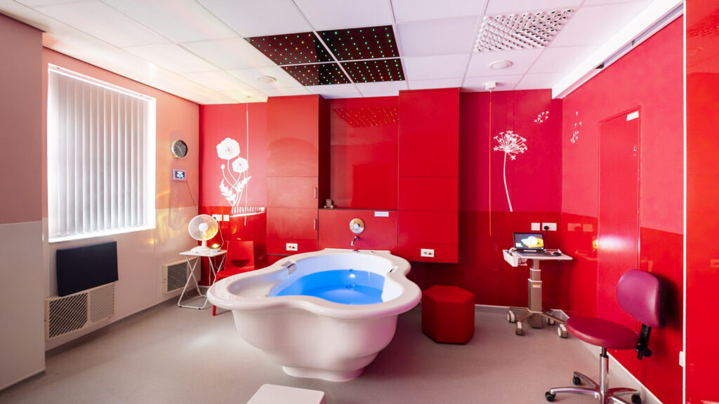 A view of a room in the Meadow Birth Centre, including a birthing pool.