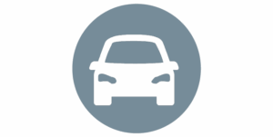 Grey circle with white graphic icon of a car