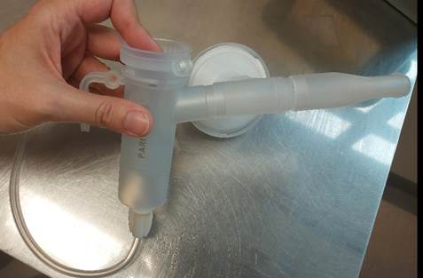 Assembled nebuliser chamber and mask