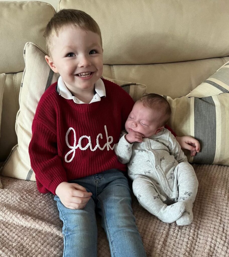 Thomas back home with his older brother.