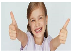 A photograph of a girl holding her thumbs up