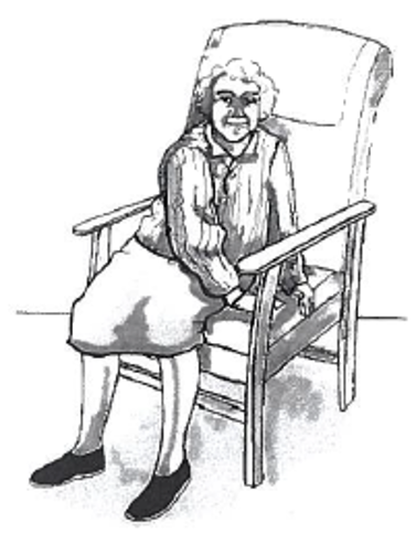 Picture of person gently turning round to sit on the armchair