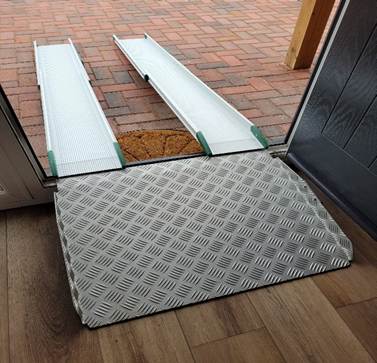 A picture of a telescopic ramp used in conjunction with Doorline ramp