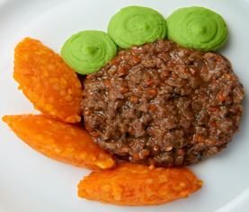 A photograph of a plate with soft food